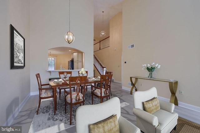 dining room featuring a high ceiling