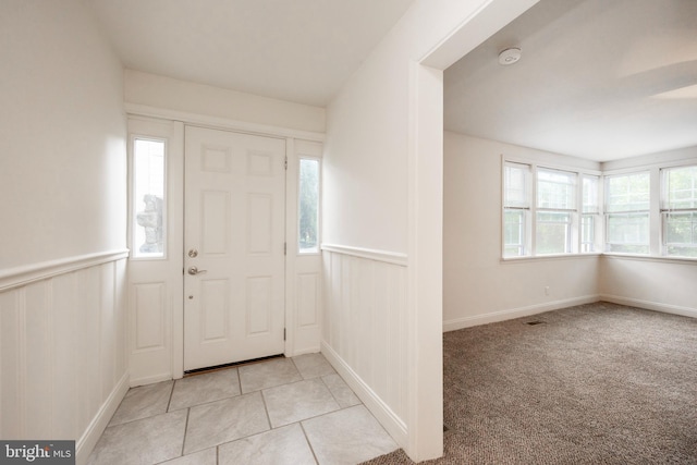 view of tiled entrance foyer