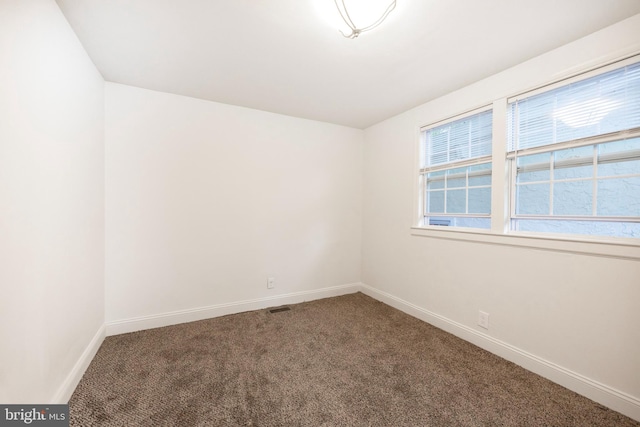 view of carpeted spare room