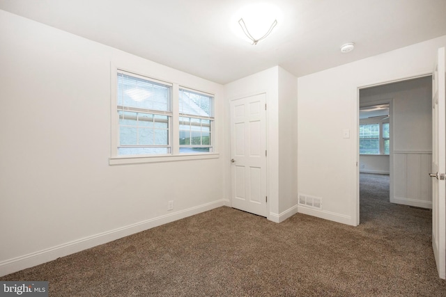 empty room with carpet floors