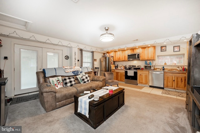 tiled living room featuring sink