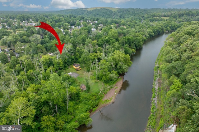 drone / aerial view with a water view