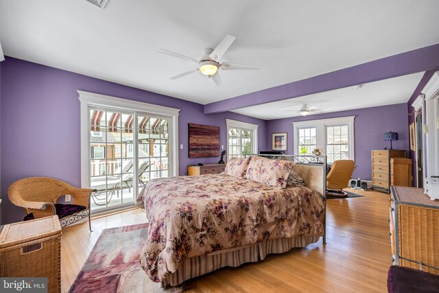 bedroom featuring ceiling fan and light hardwood / wood-style flooring