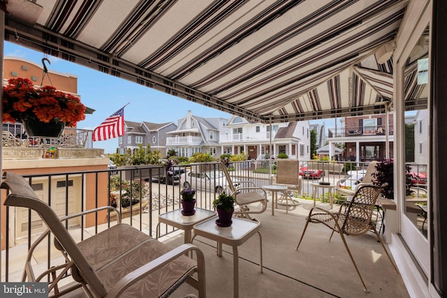 view of patio with a balcony