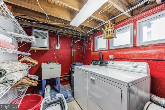 basement featuring white refrigerator and water heater