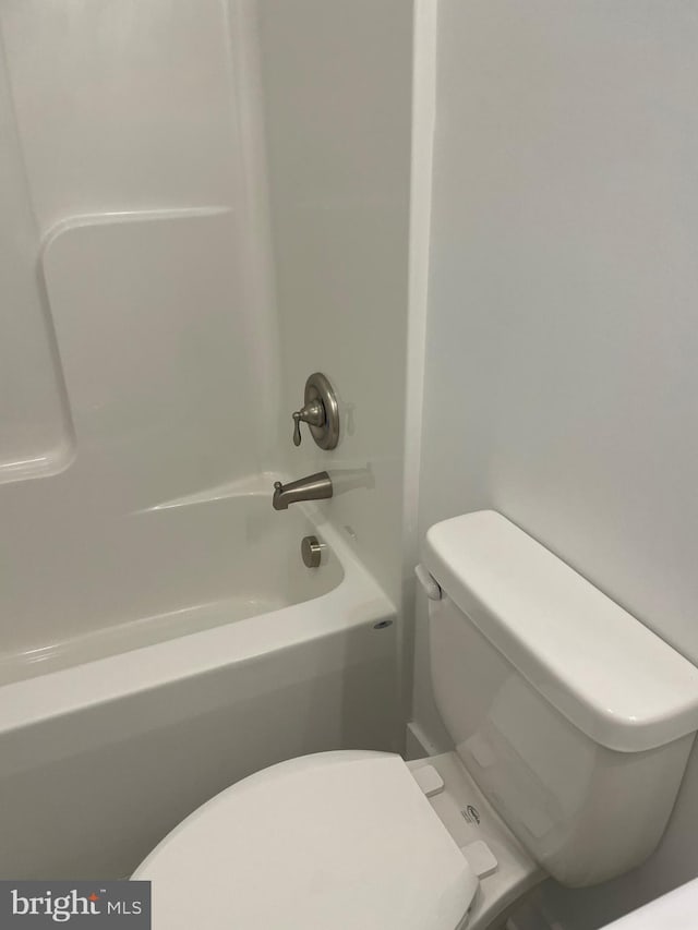 bathroom with toilet and shower / bathtub combination