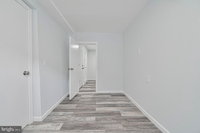 hallway featuring hardwood / wood-style floors