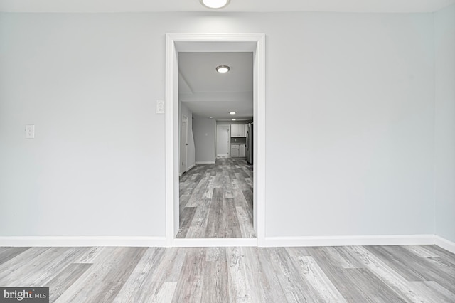 corridor featuring light wood-type flooring