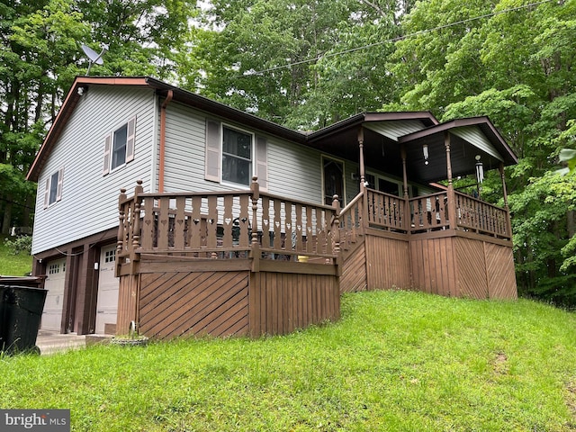 exterior space featuring a yard and a garage