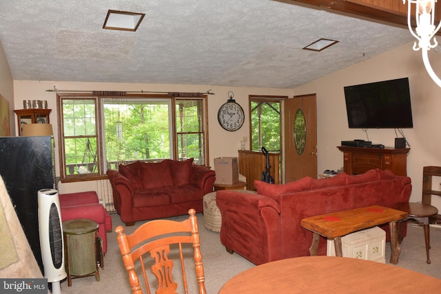 carpeted living room featuring a textured ceiling and vaulted ceiling