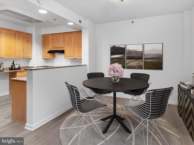 dining room featuring hardwood / wood-style floors