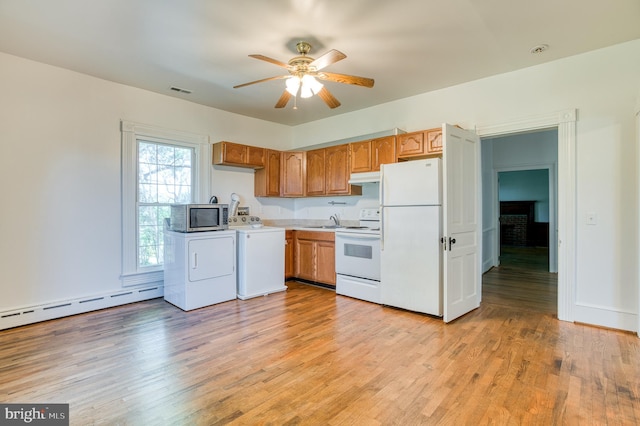 kitchen featuring washer / clothes dryer, ceiling fan, light wood-type flooring, and white appliances