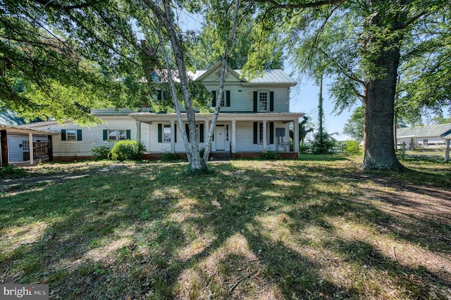 view of front of property with a front lawn