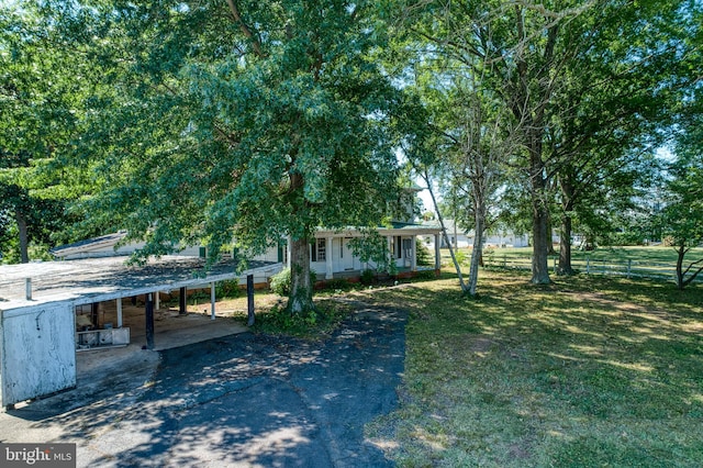 view of yard featuring a carport