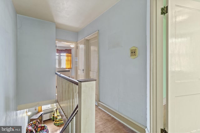 hall with light wood-type flooring