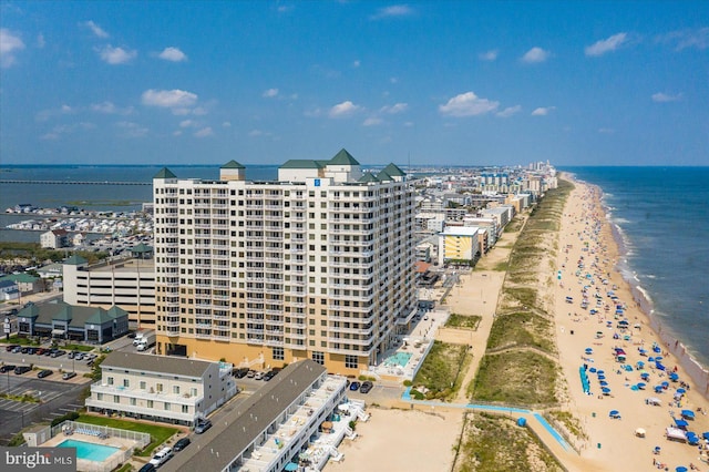 aerial view with a beach view and a water view