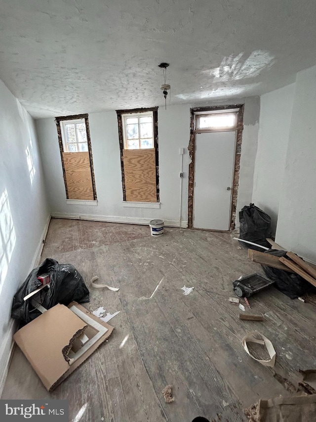 interior space featuring a textured ceiling