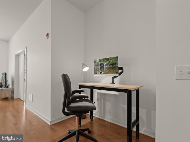 office space featuring hardwood / wood-style floors