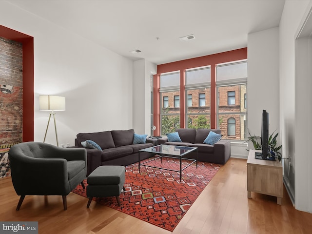 living room with light hardwood / wood-style flooring