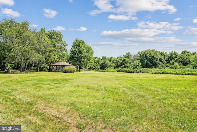 view of yard with a gazebo and a rural view