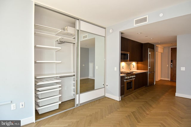 closet featuring sink