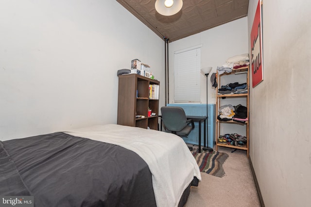 carpeted bedroom featuring lofted ceiling