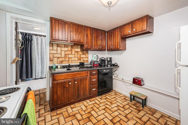 kitchen with range, dishwasher, white fridge, and sink