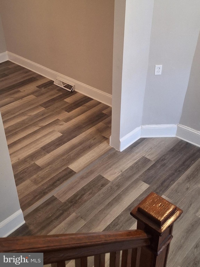 stairway with wood-type flooring