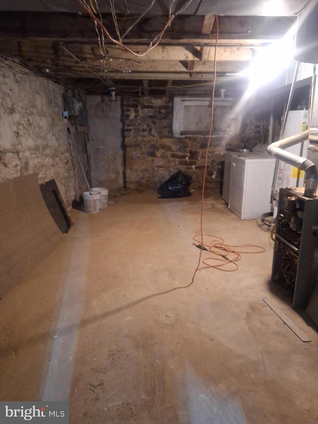 basement with washing machine and clothes dryer