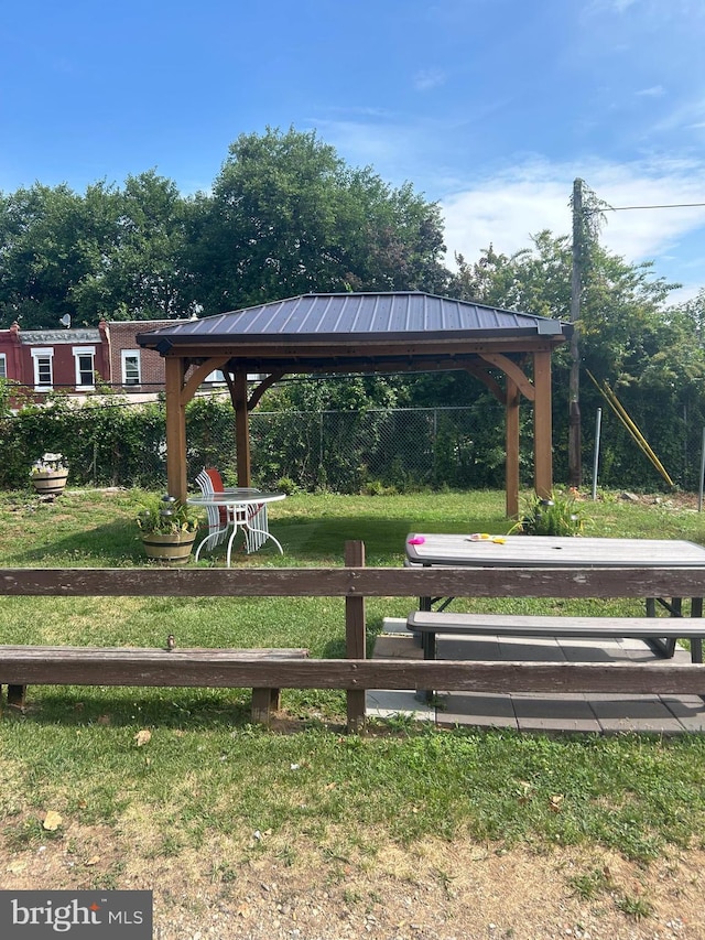 view of community featuring a gazebo and a lawn