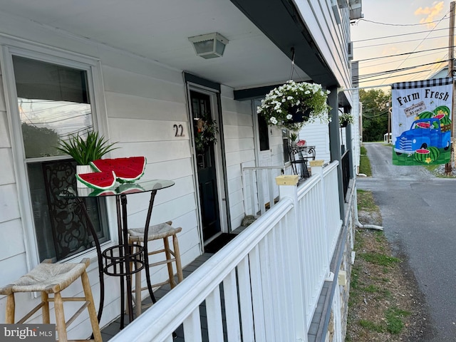 exterior space featuring covered porch