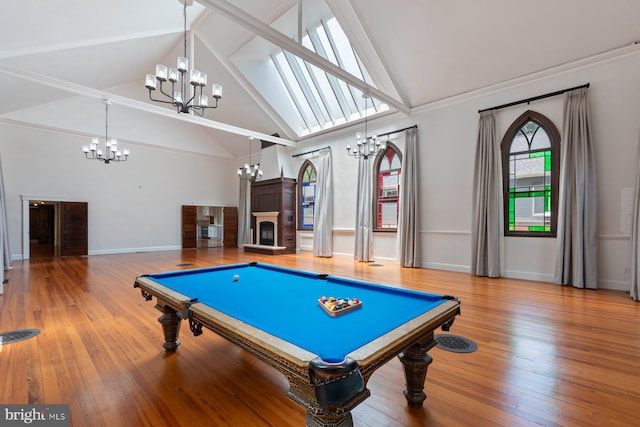 playroom with crown molding, high vaulted ceiling, wood-type flooring, and billiards