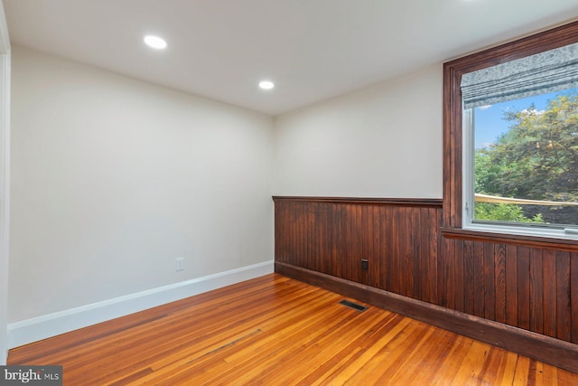 empty room featuring hardwood / wood-style floors