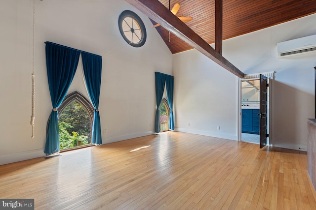 unfurnished living room featuring beam ceiling, wooden ceiling, high vaulted ceiling, a wall mounted AC, and light wood-type flooring