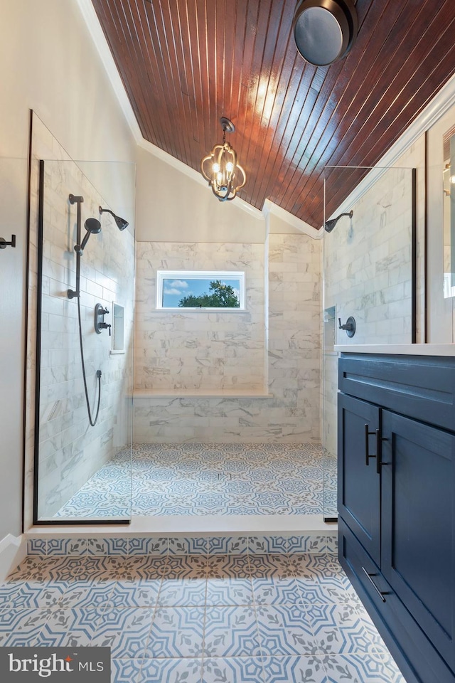 bathroom featuring a tile shower, lofted ceiling, ornamental molding, and wood ceiling