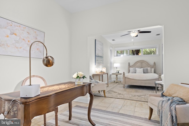 bedroom featuring ceiling fan and light tile patterned flooring