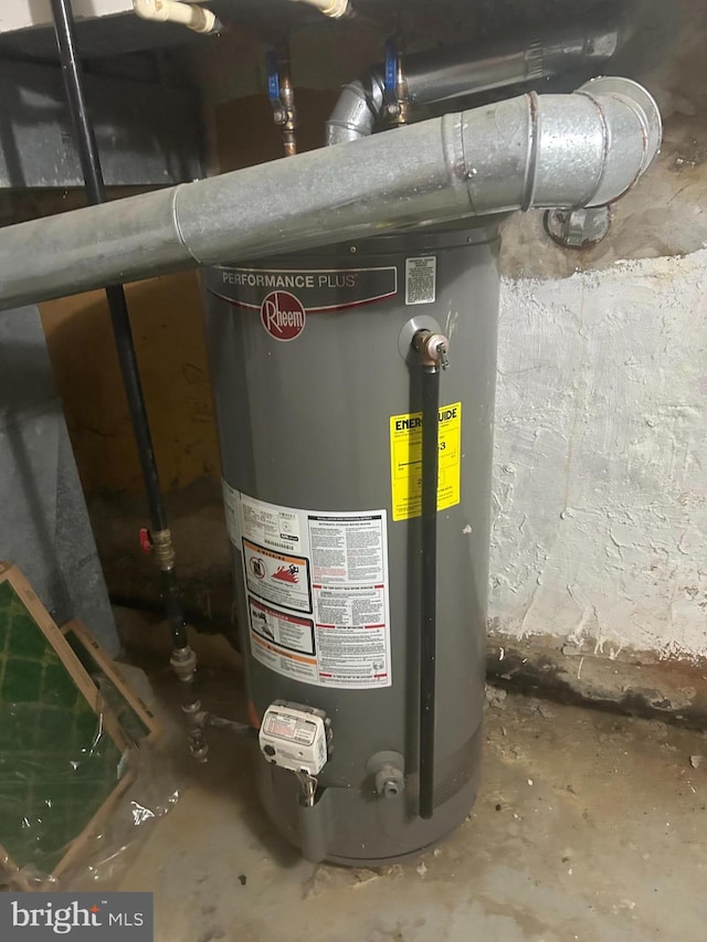 utility room with water heater