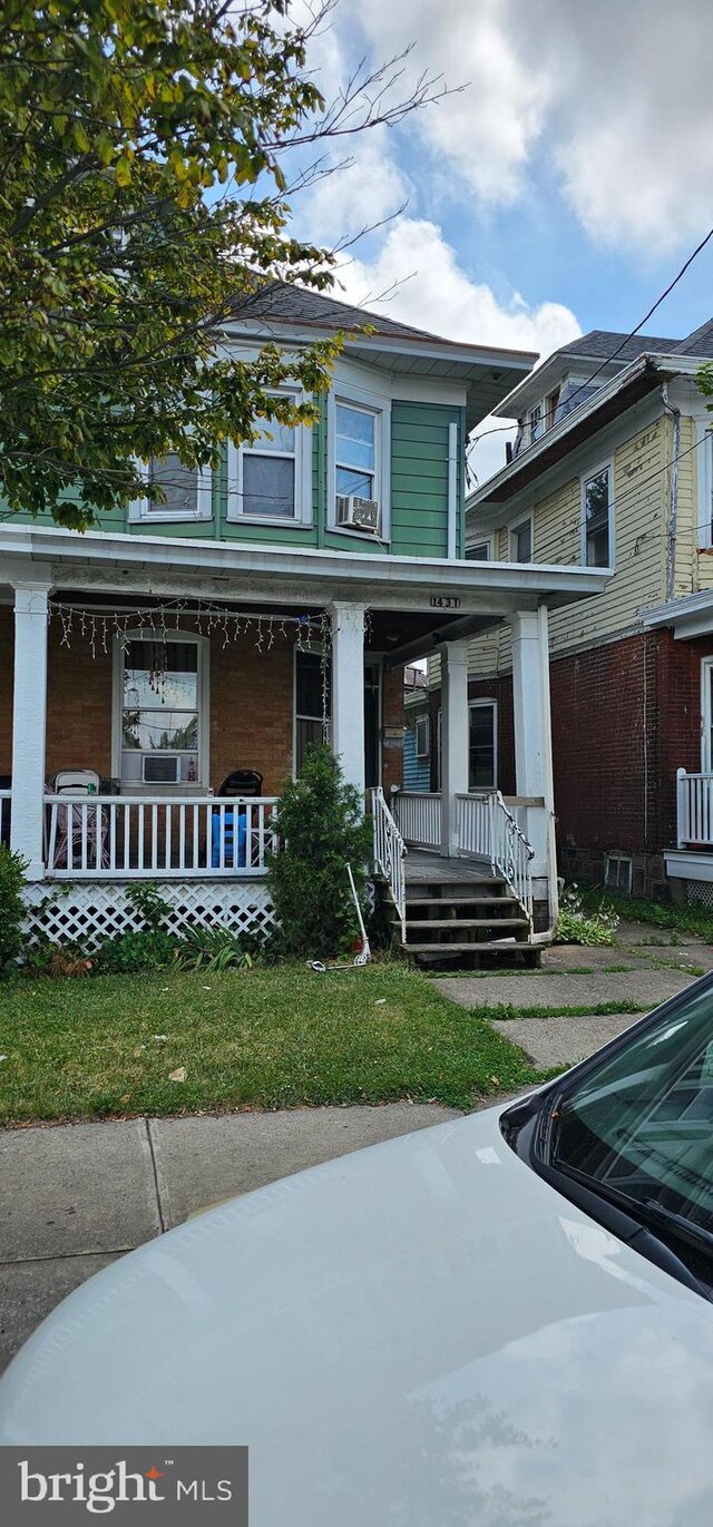 view of front of property with a porch