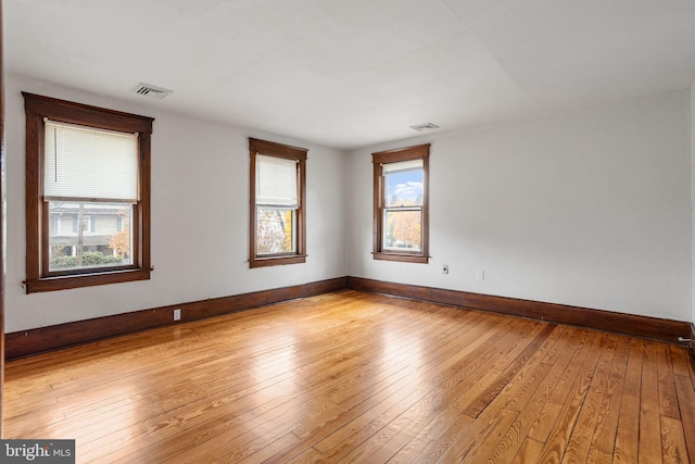 75 Church St, Beverly, NJ 08010 - spare room featuring light hardwood / wood-style floors and plenty of natural light