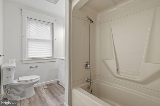 75 Church St, Beverly, NJ 08010 - full bathroom with toilet, shower / bath combination, a wealth of natural light, and hardwood / wood-style flooring