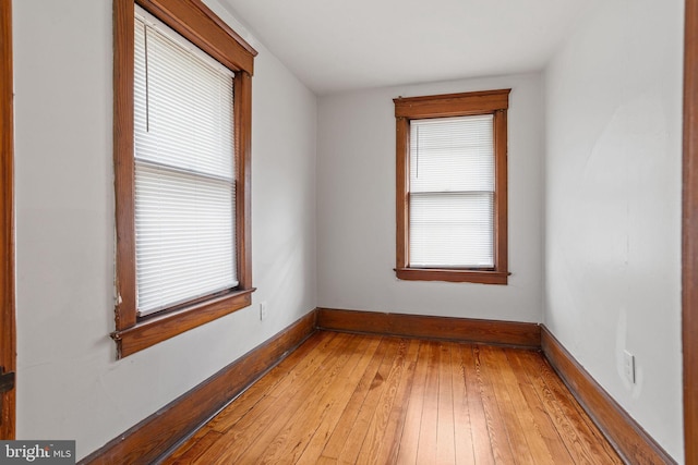 75 Church St, Beverly, NJ 08010 - empty room featuring light wood-type flooring and plenty of natural light