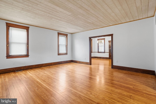 75 Church St, Beverly, NJ 08010 - empty room with light wood-type flooring, crown molding, a chandelier, and wood ceiling