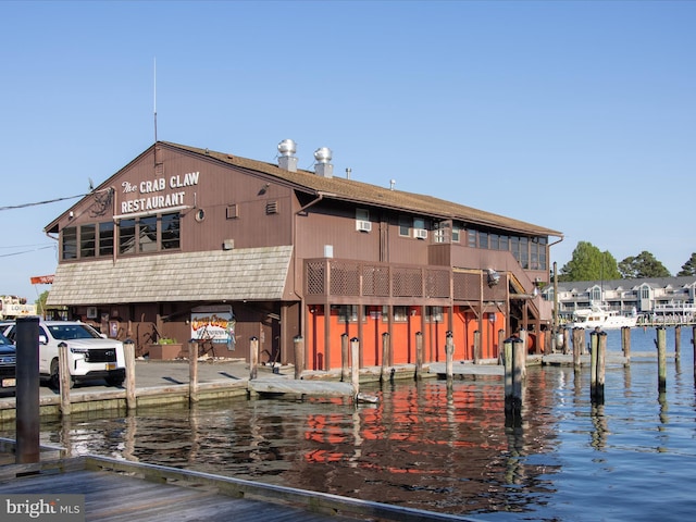 dock area featuring a water view