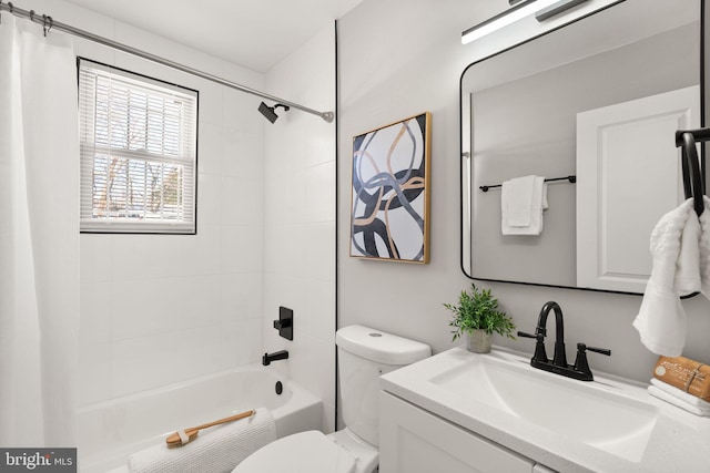 full bathroom featuring vanity, toilet, and shower / tub combo