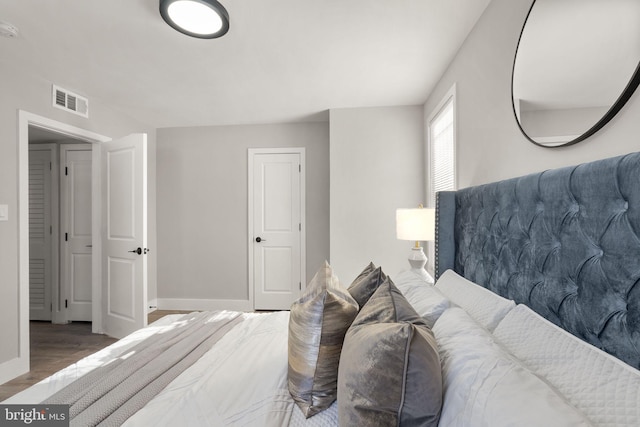 bedroom featuring hardwood / wood-style flooring