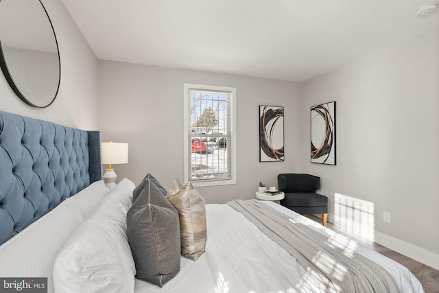 bedroom featuring wood-type flooring