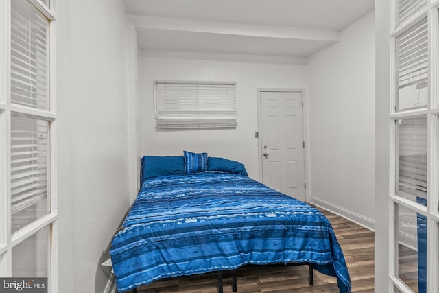 bedroom with wood-type flooring