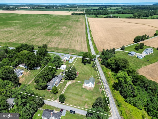 birds eye view of property featuring a rural view