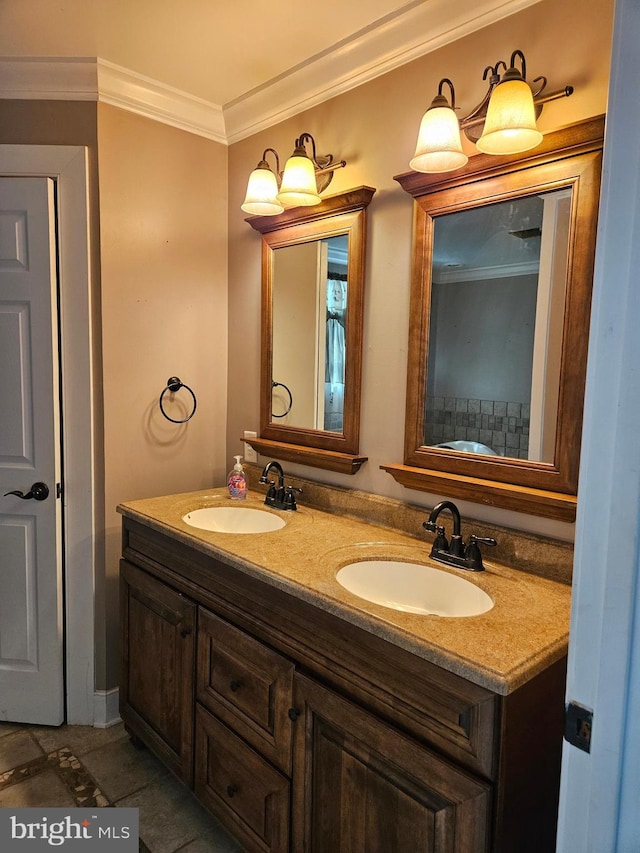 bathroom featuring ornamental molding and vanity