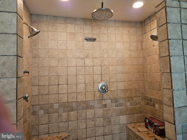 bathroom featuring a tile shower